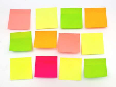 several blank paper notes on a white backgroundの写真素材