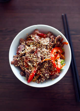 asian salad with vegetables, beef and sesameの写真素材