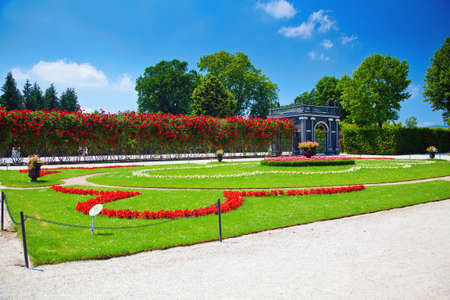 beautiful roses, lawn and pavilion in the Schonbrunn gardensの写真素材