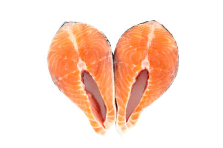 upper view of two raw salmon steakes isolated on a white backgroundの写真素材