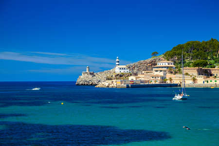small lighthouse at the pier of Port de Soller, Majorca, Spain