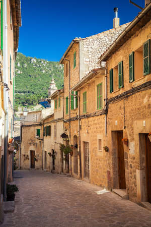 sunny stone street in village Valldemossa, Mallorca, Spainの写真素材