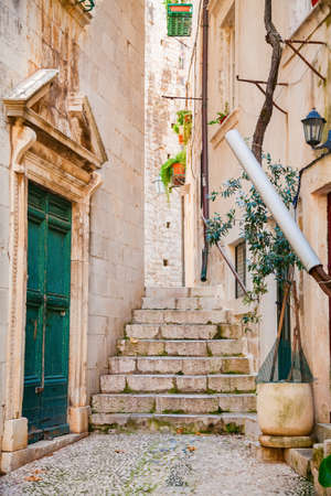 small narrow street in the Old Town of Dubrovnik, Croatiaの写真素材