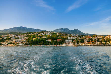 View of a Herceg Novi town from water. It's a coastal town located at the entrance to the Bay of Kotor and at the foot of Mount Orjen in Montenegro.の写真素材