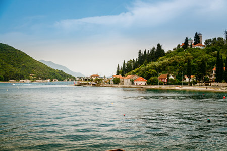 Beautiful landscape in the Bay of Kotor, Montenegro. View of Kamenari village and Church of Holy...
