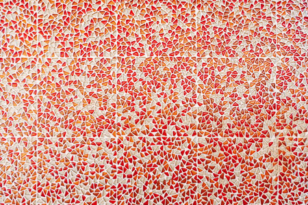 Wall background with red and white triangle shaped mosaic tile