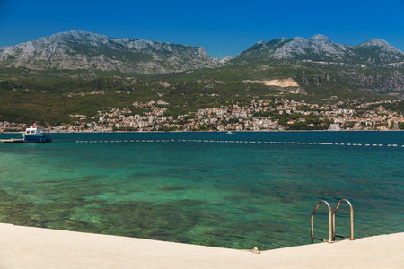 Picturesque view of the small town Herceg Novi in the Bay of Kotor, also known as the Boka, in Montenegro. View from the opposite coast.の写真素材