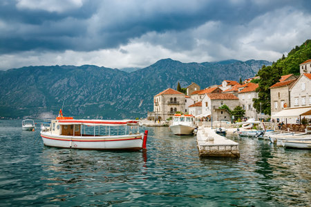Cloudy landscape in the historic town of Perast in Bay of Kotor, Montenegroの写真素材