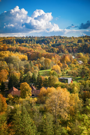 Puckoriu atodanga in Pavilniai Regional Park, Vilnius, Lithuania, during autumn, features a scenic view of colorful foliage in green, yellow, and orangeの写真素材