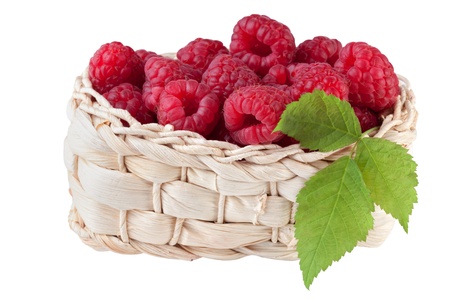 raspberry in basket, isolated on white backgroundの写真素材
