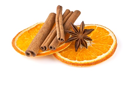 orange slices, cinnamon and anise isolated on whiteの写真素材