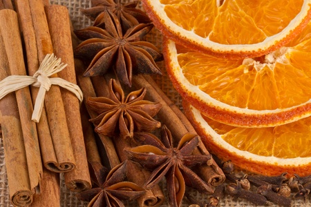 Christmas spices on jute background, close upの写真素材