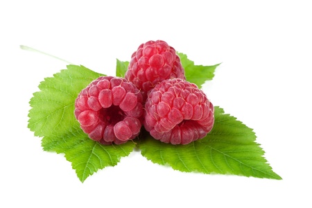 fresh raspberries with leaf isolated on whiteの写真素材