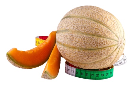 melon with tape measure, isolated on whiteの写真素材