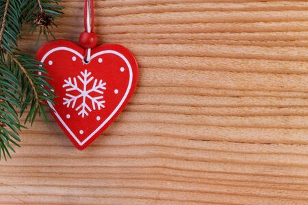 red heart on wooden background, christmas decorationの写真素材