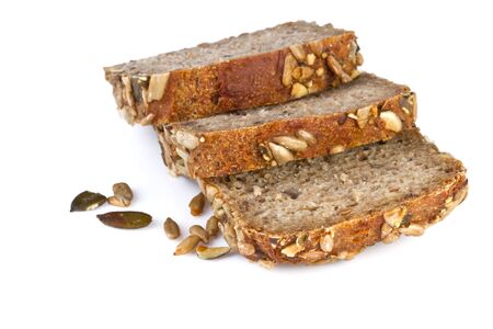 sliced whole wheat bread, on white backgroundの写真素材
