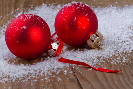 Christmas red balls on wooden backgroundの写真素材