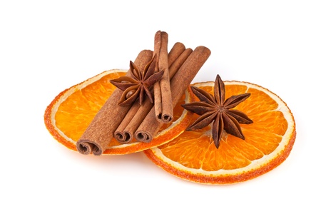 orange slices, cinnamon and anise isolated on whiteの写真素材