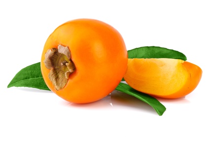 persimmons with leaves, isolated on white backgroundの写真素材