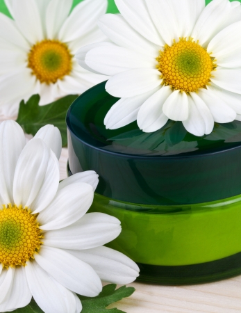 body and face care concept with camomile flowersの写真素材