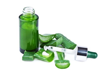 aloe vera slices with pipette and serum, isolated on white backgroundの写真素材
