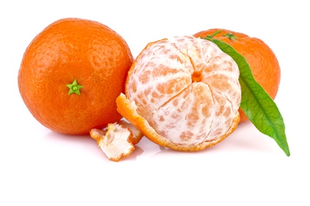 close up of tangerine or mandarine with leavesの写真素材