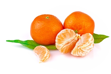 tangerine or mandarine with leaves, isolated on white backgroundの写真素材