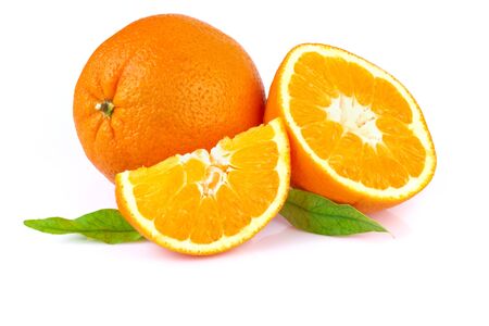fresh orange with leaves isolated on whiteの写真素材