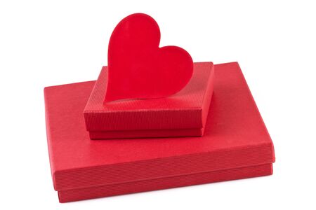 two red gift boxes with heart isolated on white backgroundの写真素材