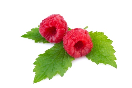 fresh raspberry with leaf on white  backgroundの写真素材
