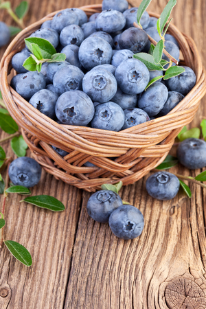 Blueberries on wooden backgroundの写真素材