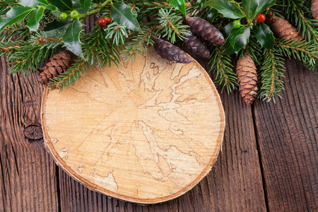 Vintage Wooden Background with Pine Branch and Tree Ringの写真素材