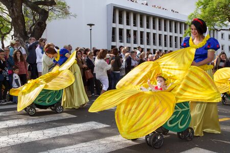 FUNCHAL, MADEIRA - APRIL 20, 2015: Mothers with babies in prams at the Madeira Flower Festival,...