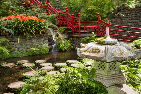 Pond and garden decoration in oriental style. Monte Palace Tropical Garden. Funchal, Portugalのeditorial素材
