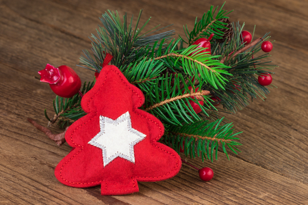 Christmas red decoration over woodの写真素材