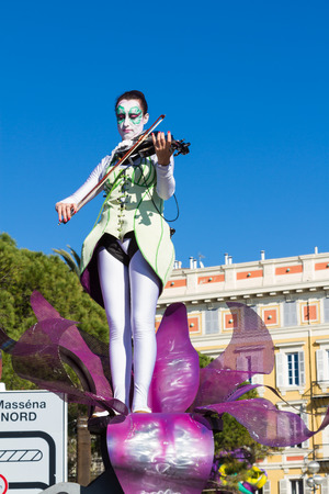 Nice, France - February 22, 2015: The Carnival of Nice is main winter event on the Riviera and one of the largest carnivals in the world, offering a programme of unforgettable entertainment. The theme for 2015 was King of Music.のeditorial素材