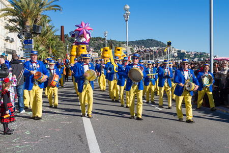 Nice, France - February 22, 2015: Participants in the carnival parade in Nice. The theme for 2015 was King of Music.The Carnival of Nice is an annual event.のeditorial素材
