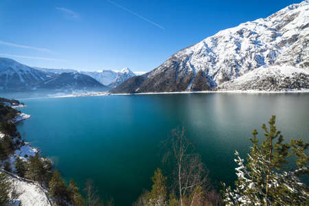 Idyllic mountain landscape in winter, Achenlake, Alps, Austriaの写真素材