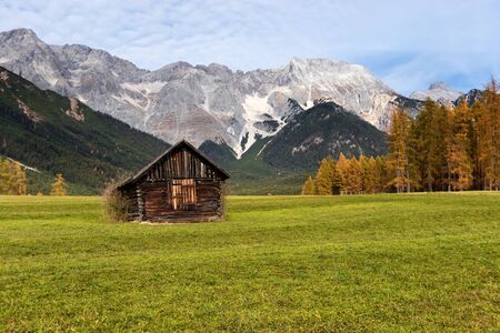 Autumn rural scenery of Miemenger Plateau with rocky mountains peaks in the background. Austria, Europe, Tyrol.のeditorial素材