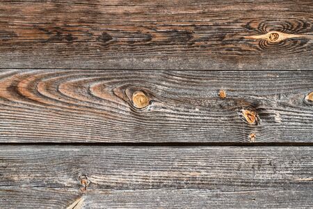Vintage wooden background. Old wooden grey brown weathered background texture.の写真素材