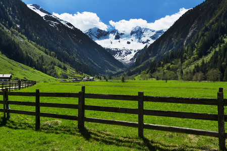 Mountain scenic with wood fence in Stilluptal Mayrhofen Austria Tirolの写真素材
