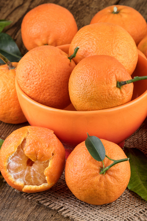Mandarin in orange bowlの写真素材