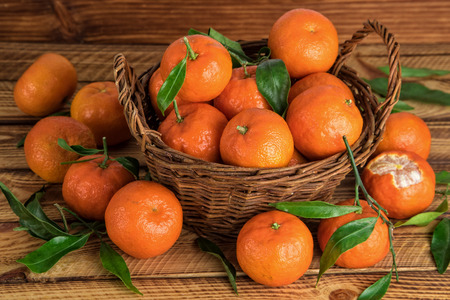 Mandarins basket organic fruits in close-upの写真素材