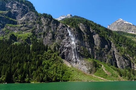 Panoramic view of the waterfall on the Lake Stillup in the Alps, Austria, Tyrolの写真素材