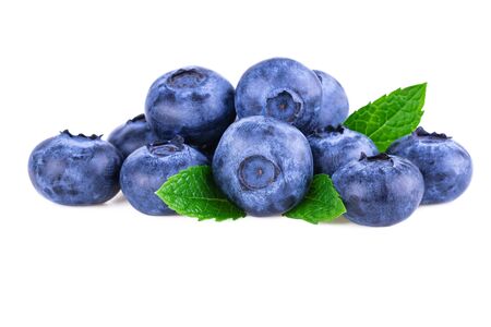 Blueberries. Stack of fresh blueberry with mint leaves isolated on whiteの写真素材