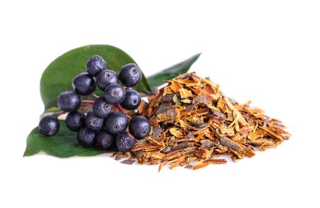 Buckthorn bark or alder buckthorn dried loose chopped tree bark on whiteの写真素材