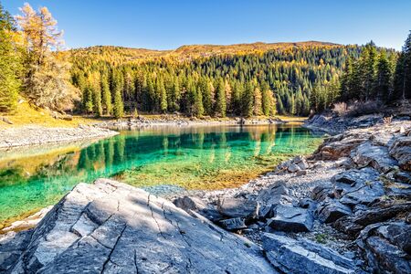 Mountain lake at sunny day. Alps, Austria,Tyrol, Lake Obernberg, Stubai Alps. 