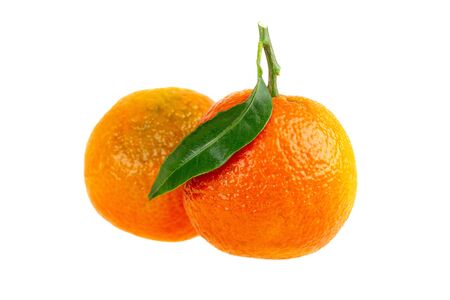 two mandarin orange fruit isolated on whiteの写真素材