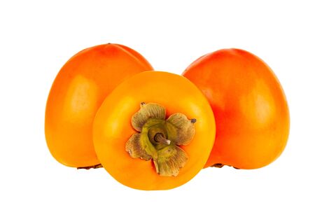 Persimmons fruit or three kaki fruits isolated on whiteの写真素材