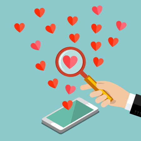 Concept of love or relationship. Hand with magnifying glass looks at heart.のイラスト素材